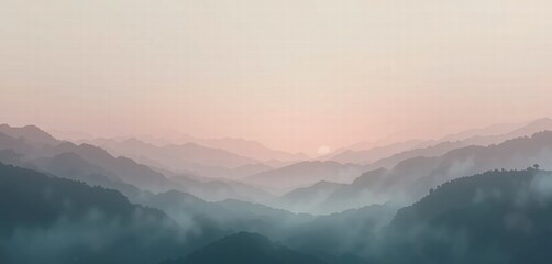 Fototapeta premium Misty morning wallpaper image of mountains with fog and clouds over hills and valleys at sunrise