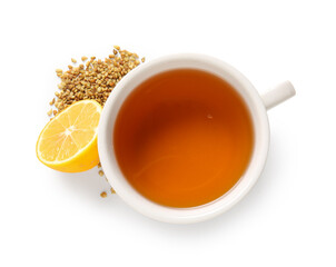 Cup of hot buckwheat tea with lemon on white background