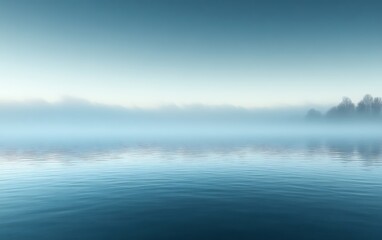 Fototapeta premium Misty lake at dawn, tranquil water reflecting serene sky.