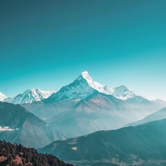 A majestic mountain range under a clear sky