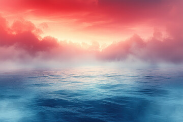 Misty ocean sunrise with colorful clouds and fog