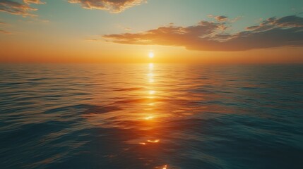 Obraz premium Golden sunset over tranquil ocean waters