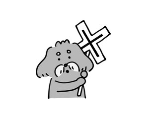 バツを掲げる犬
