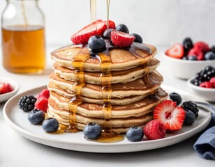 stack of pancakes with berries