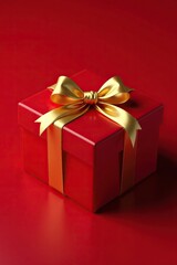 Fototapeta premium Elegant gold ribbon wrapped around a red gift box, luxury, ribbon