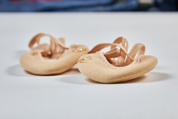 Shoes for rhythmic gymnastics , semi-lyrical nude-colored shoes highlighted