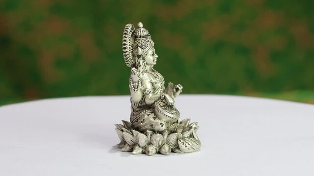 Goddess Saraswati, Godess of  learning, arts, and music. 925 Silver Indian Deity Idol High Detail Finish for Pooja and Home Decor. Hindu Religions. Maa Saraswati seated on a lotus flower with Veena