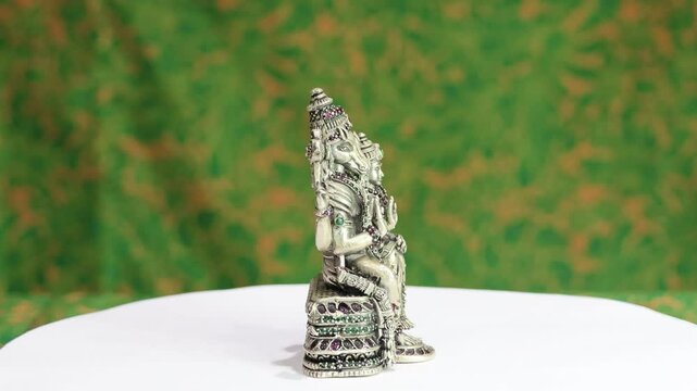 Vishnu also known as Narayana and Hari, is one of the principal deities of Hinduism. He is said to appear on Earth in various forms, known as avatars, to maintain cosmic harmony and fight demons.