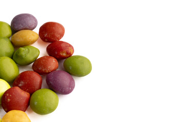 small cluster of Dye-free natural candy with no artificial ingredients isolated on a white background in groups based on the color, healthier alternative, good option for ADHD children