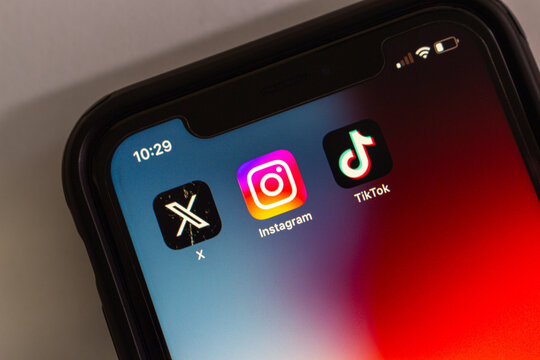 Mexico City, MEXICO - Dec 4 2024 : X app, Instagram and TikTok icons are displayed on an iPhone home screen. Popular social networking apps concept image