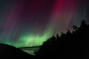 Bridge Silhouetted Northern Lights Along