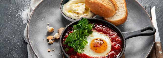 Fried eggs. Shakshuka middle east meal.