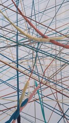 Fototapeta premium Abstract art of interconnected colorful threads symbolizing unity