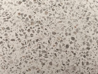 Cream, grey, brown, black stone pattern on white background.
