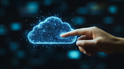Accessing the Cloud: A hand reaches out to touch a glowing, digital cloud, symbolizing connection, innovation, and the boundless potential of cloud computing.  