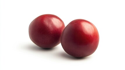 Obraz premium Fresh nectarines displayed on a clean white background showcasing their vibrant color and smooth texture for food and fruit concepts.