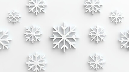 White snowflakes on a white background creating a winter wonderland atmosphere for design purposes