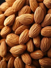 Fototapeta premium A close-up view of almonds, showcasing their textured shells and natural color.