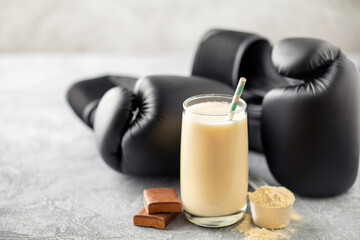 Protein sport whey shake, bar and workout equipment. Fitness food and drink.