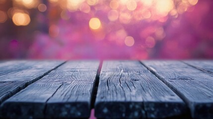 A rustic wooden table close-up with a dreamy pink and purple bokeh backdrop for a romantic visual effect