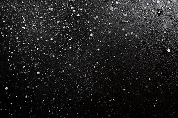 Obraz premium Black glitter texture background, glitter or sandpapper high detailed surface, shining glowing effects 