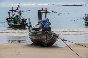landscape with sea view and fishing boat in thailand