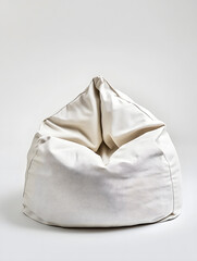 large, soft bean bag in neutral color, perfect for relaxation and comfort. Its plush design invites you to sink in and unwind, making it ideal addition to any cozy space