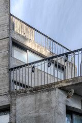 Railings on rooftops or staircases that prevent falls and assist movement. Functional and safety-oriented design.