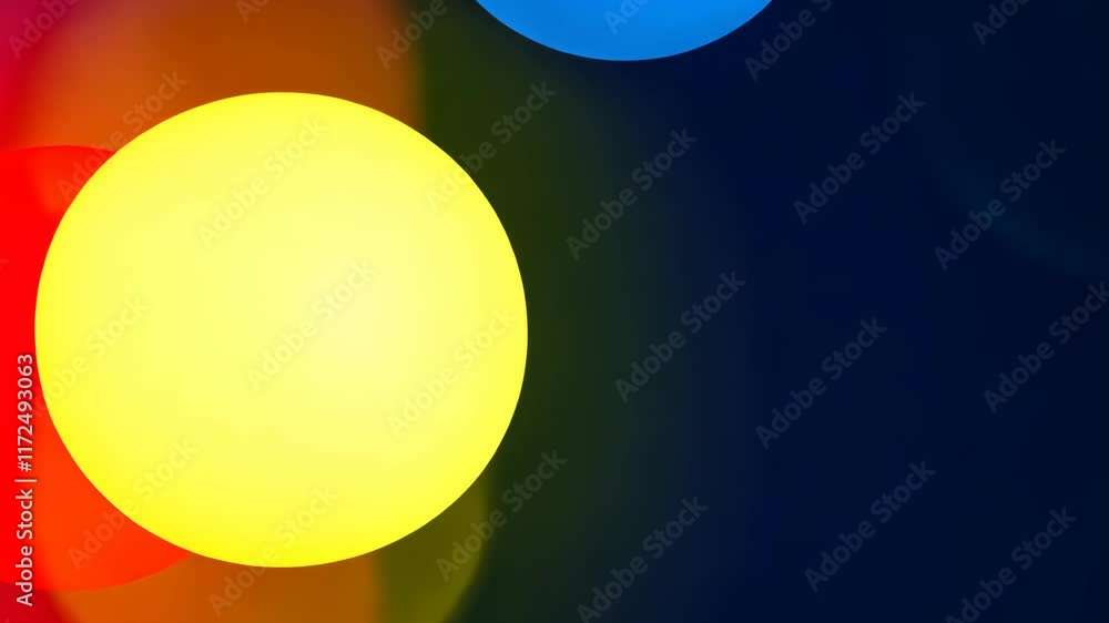Poster bright colored circles create a vibrant abstract composition against a dark background