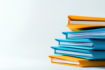 Stack of office folders in bold colors, minimalist design highlighting blue and yellow file tabs on a pristine white backdrop