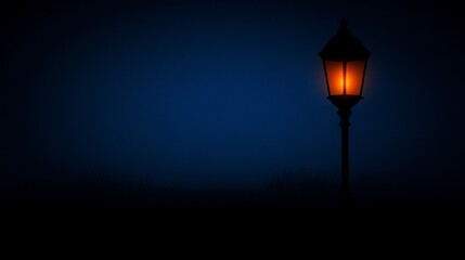 Solitary lamppost glowing in the night.