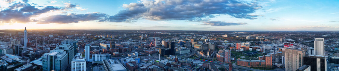 Naklejka premium High Angle Ultra Wide Panoramic View of Buildings at Downtown Central Birmingham City of England United Kingdom During Sunset. Aerial View of Was Captured with Drone's Camera on March 30th, 2024