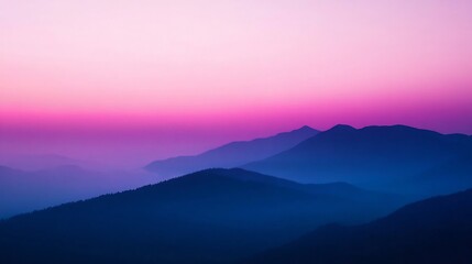 Obraz premium Misty Mountain Silhouettes at Serene Twilight with Text Space