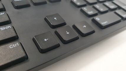 Close-up of computer keyboard arrow keys