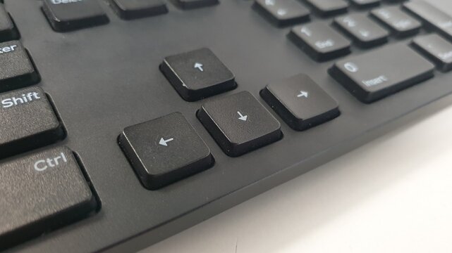 Close-up of computer keyboard arrow keys