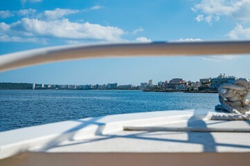 Fototapeta premium Coastal cityscape viewed from a boat