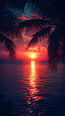 Vibrant sunset over calm ocean, viewed through palm tree fronds.
