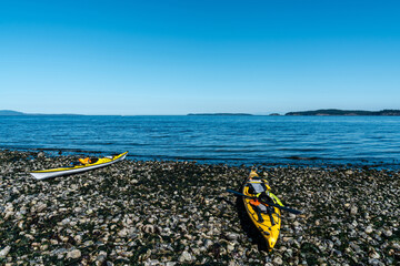 Kayaks on beach at Orcas Island in the San Juan Islands in the Pacific Northwest in Washington 