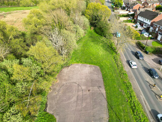 Aerial View of Bedford City of Bedfordshire, England United Kingdom During Windy and Mostly Cloudy Day. High Angle Footage Was Captured with Drone's Camera on April 5th, 2024 from Medium High Altitude