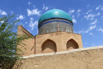 Fototapeta premium Rabia Sultan Begim Tomb is located in the garden of Ahmet Yesevi Complex. The tomb was built in the 15th century during the Timur period.