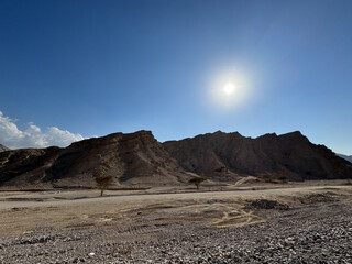 Jebel Jais, the UAE's tallest mountain, offers stunning views, with cooler UAE temperatures. A haven for adventurers, it combines rugged beauty with serene sunsets.