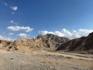 Jebel Jais, the UAE's tallest mountain, offers stunning views, with cooler UAE temperatures. A haven for adventurers, it combines rugged beauty with serene sunsets.