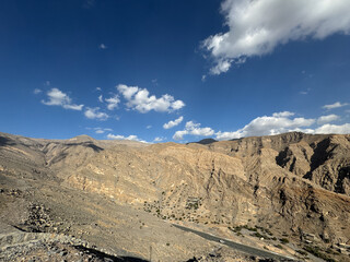 Jebel Jais, the UAE's tallest mountain, offers stunning views, with cooler UAE temperatures. A haven for adventurers, it combines rugged beauty with serene sunsets.