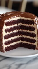 Obraz premium A rich chocolate layer cake with alternating layers of chocolate and cream filling.