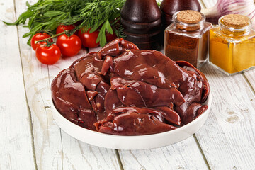 Raw chicken liver uncooked in the bowl