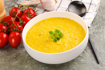 Vegetarian corn cream soup served parsley