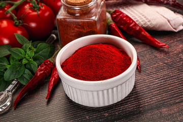 Spicy dry paprika powder in the bowl