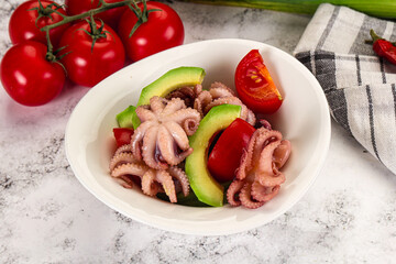 Salad with baby octopus and avocado