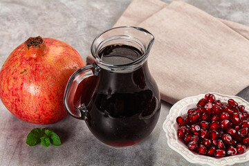Sweet fresh pomegranate juice with fruit
