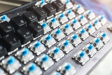Closeup computer PC keyboard mechanical key under keycaps button for cleaning or change type of key